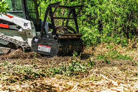 bobcat skid steer with brush cutter|bobcat attachments for clearing brush.